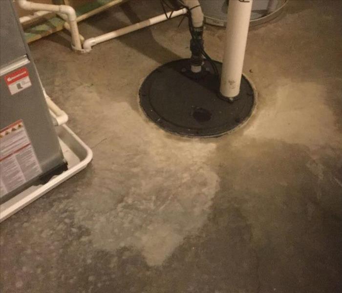 wet basement floor with sump pump